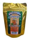 Gold foil resealable 2 oz package containing loose leaf peach tea