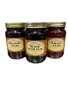 Three standard glass mason jars containing your choice of jam