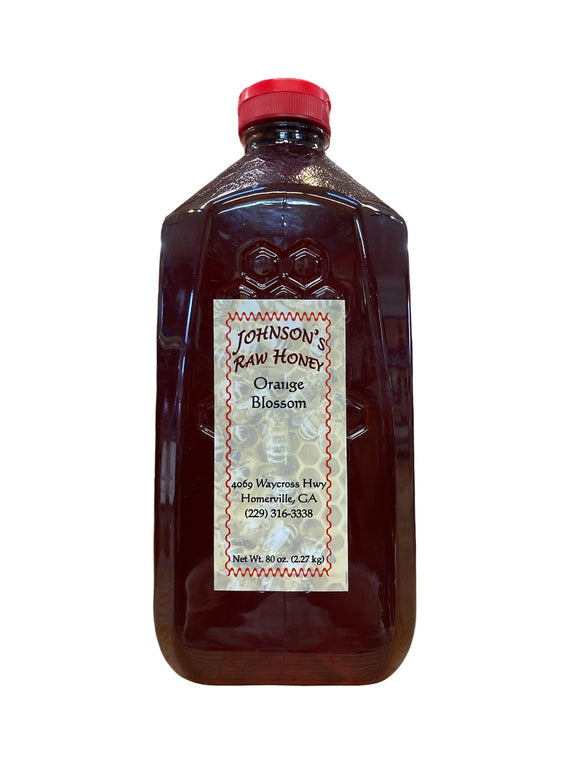 Plastic Bottle Hexagon Pattern with Snap Cap Lids containing Raw orange blossom honey