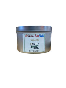 small aluminum tin containing a soy based candle
