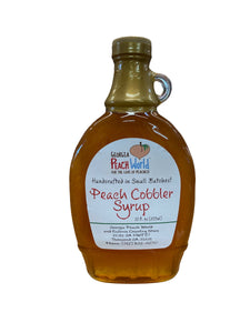 Glass handle bottle with shrink wrapped lid containing peach cobbler syrup