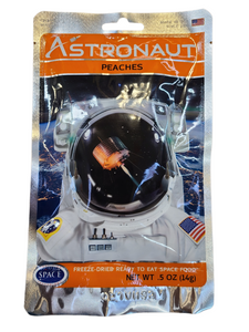 Foil packaging with astronaut in space graphic containing .5 oz of freeze dried peach slices