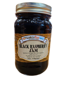 Standard glass Mason Jar containing Standard Mason Jar containing black raspberry jam