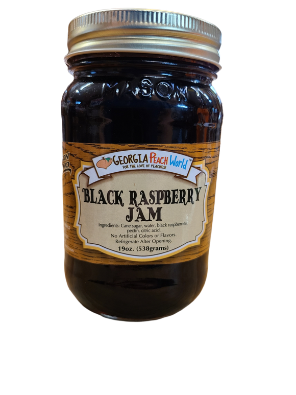 Standard glass Mason Jar containing Standard Mason Jar containing black raspberry jam