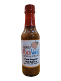 Small, tall 5 oz glass bottle containing 5 pepper hot sauce