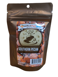 Small 2 oz brown foil package containing southern pecan coffee grounds