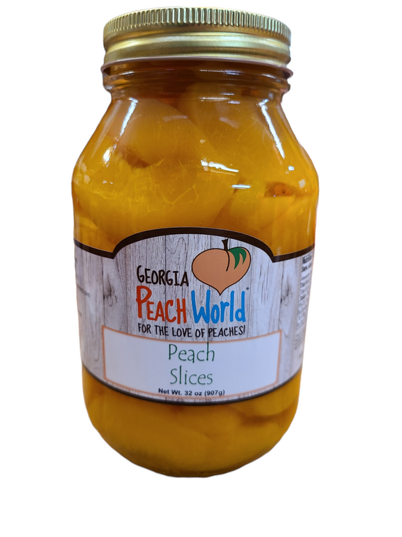 Quart sized glass jar containing skinless peach slices in water