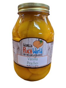 Quart sized glass jar containing skinless peach halves sitting in water with a vanilla bean