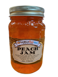 Standard glass mason jar containing peach jam