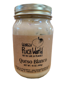 Standard lid and ring canning jar containing queso blanco (white cheese)