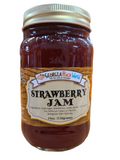 Standard glass mason jar containing strawberry jam