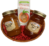 Small oval shaped basket with crinkled paper "grass". Basket is holding a standard glass mason jar containing peach jam, a standard glass mason jar containing peach salsa, and cardboard carton of peach hard candy