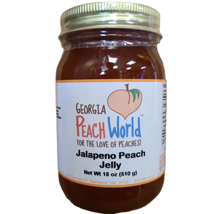 Standard glass mason jar containing jalapeno peach jelly with a shrink wrap lid seal