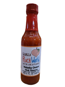 Tall 12 oz glass bottle with a shrink wrapped lid containing vidalia onion hot sauce
