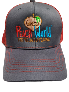 Charcoal colored Richardson brand trucker style hat with a red mesh back printed with Georgia Peach World branding logo