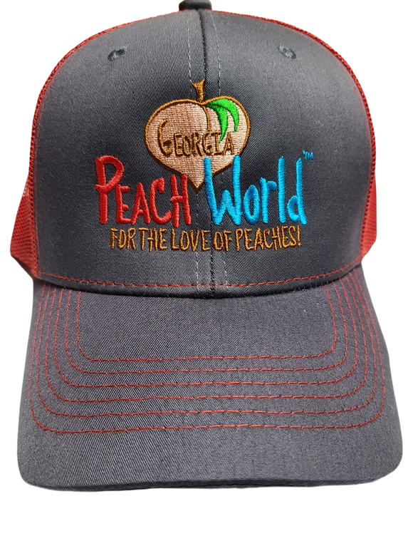 Charcoal colored Richardson brand trucker style hat with a red mesh back printed with Georgia Peach World branding logo