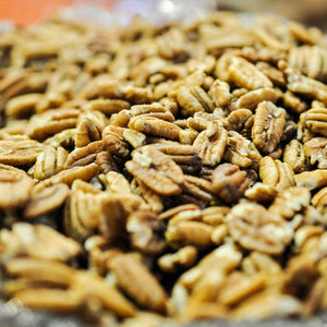 Gallon sized resealable bag containing raw pecan halves